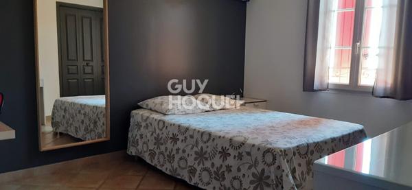 Maison spacieuse à vendre à Nîmes avec piscine et jardin