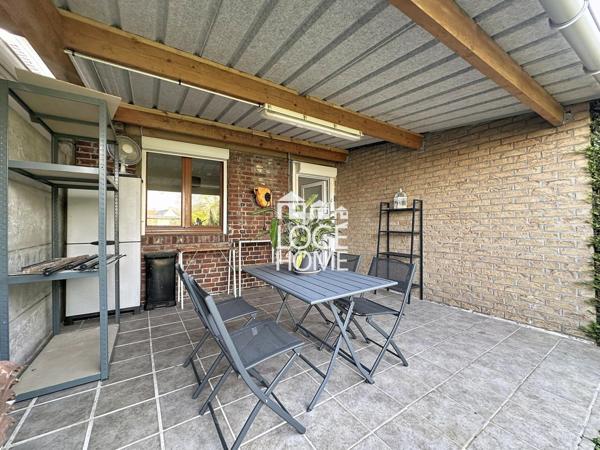 Coquette maison de village en semi plain pied offrant 2 chambres jardin garage