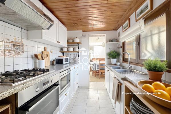 Coquette maison de village en semi plain pied offrant 2 chambres jardin garage