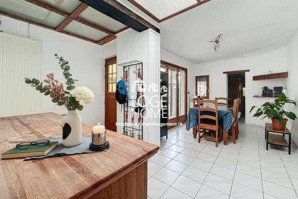 Coquette maison de village en semi plain pied offrant 2 chambres jardin garage