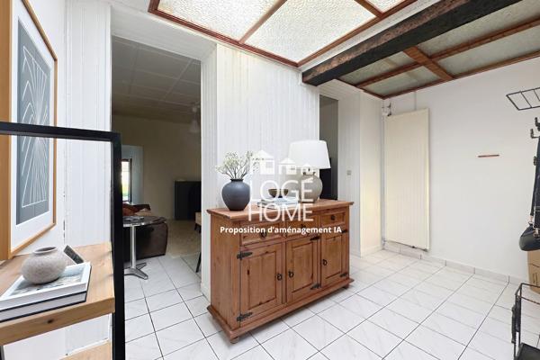 Coquette maison de village en semi plain pied offrant 2 chambres jardin garage