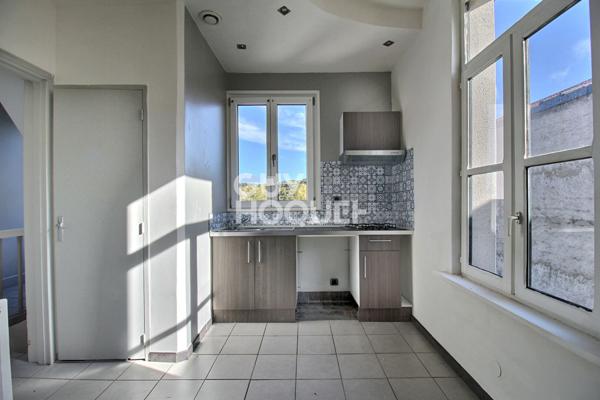 MAISON DE VILLE AVEC GARAGE TERRASSE ET JARDIN A MARBACHE