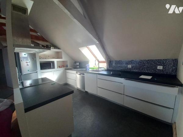 Immeuble plein centre