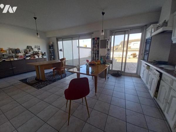 Immeuble plein centre