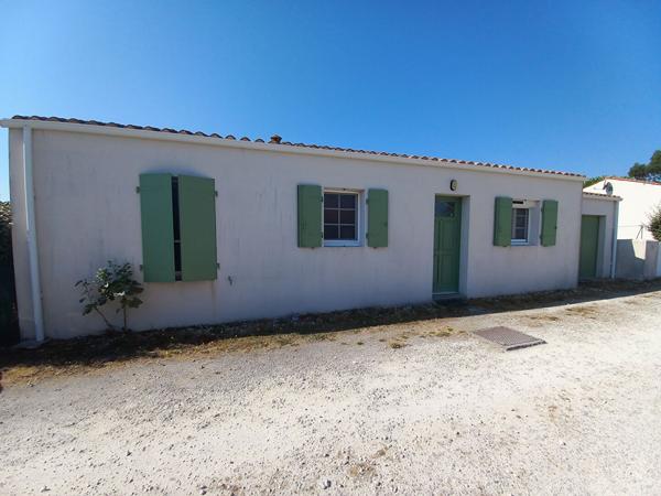 Maison récente avec garage et jardin clos dans une résidence intimiste