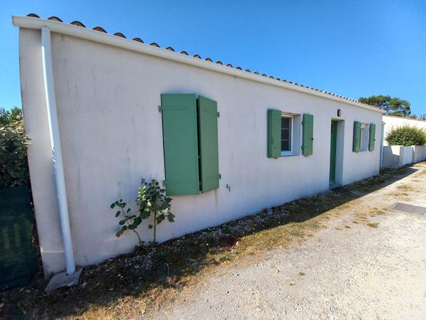 Maison récente avec garage et jardin clos dans une résidence intimiste