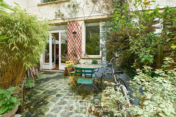 Triplex avec terrasse sur une cour végétalisée