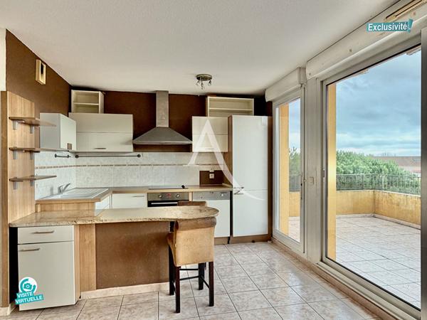 LATTES - QUARTIER PORT ARIANE DANS UNE RÉSIDENCE DE 2002 AVEC ASCENSEUR - T2 CLIMATISÉ - 43,40 m2 - TERRASSE 20 M2 - PARKING + GARAGE FERMÉ. COMMERCES À PROXIMITÉ ET TRAMWAY À 600M.