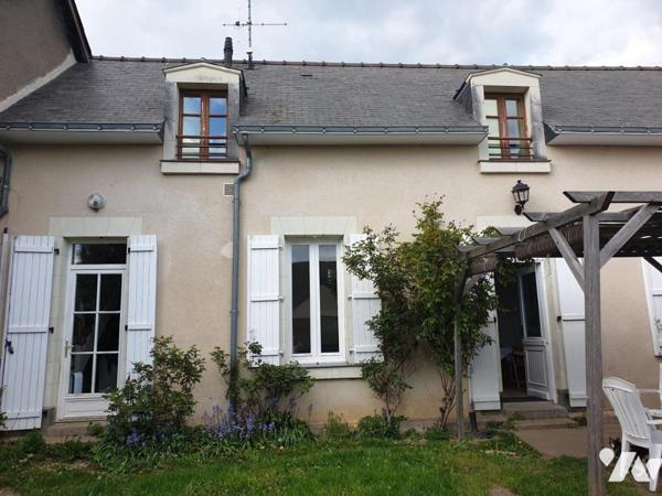 Maison centre ville de Château-Gontier avec deux chambres, jardin et dépendance.