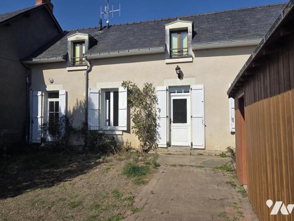 Maison centre ville de Château-Gontier avec deux chambres, jardin et dépendance.