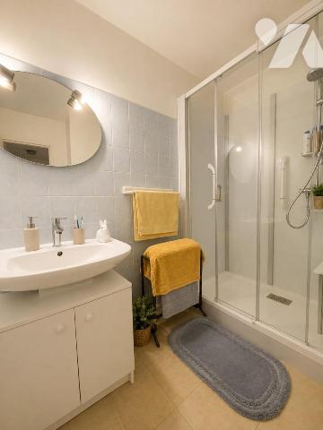 A VENDRE - REZE - 8 Mai - Appartement T4 d'env 68.63m² avec balcon, cave et parking en sous-sol.