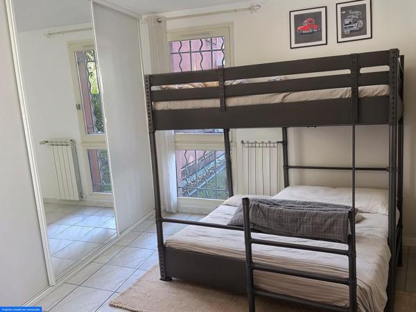 T3/4 RDC 80m2 + LOGGIA11m2 SUR COUR ARBORÉE