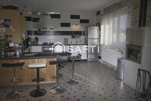 Maison avec revenu locatif complémentaire à Saint Denis les Bourg proche de la gare