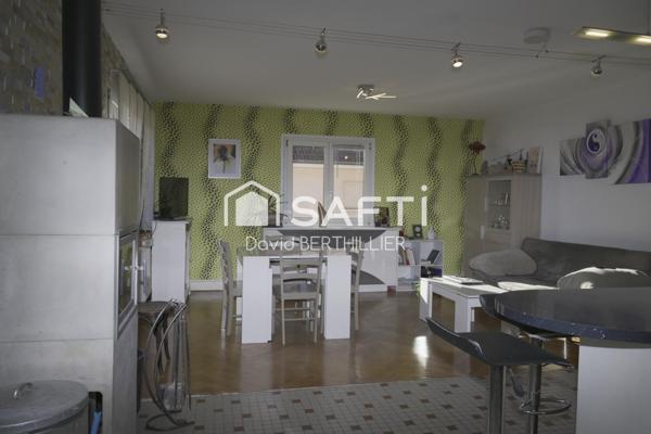 Maison avec revenu locatif complémentaire à Saint Denis les Bourg proche de la gare