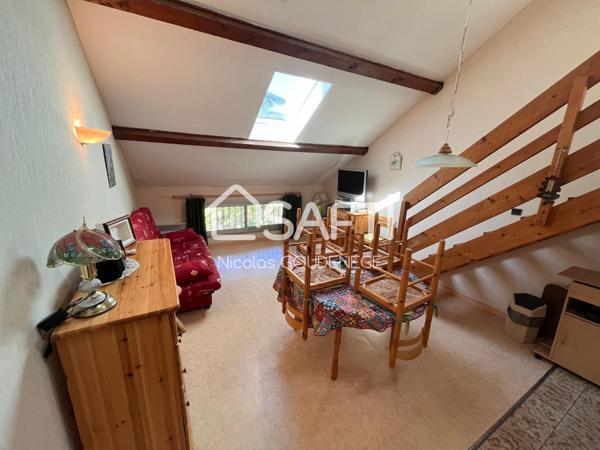 Grand T2 40m² avec parking et local