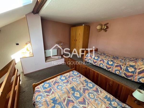 Grand T2 40m² avec parking et local