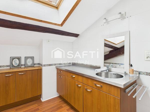 Duplex de charme avec vue imprenable sur les Monts d’Or