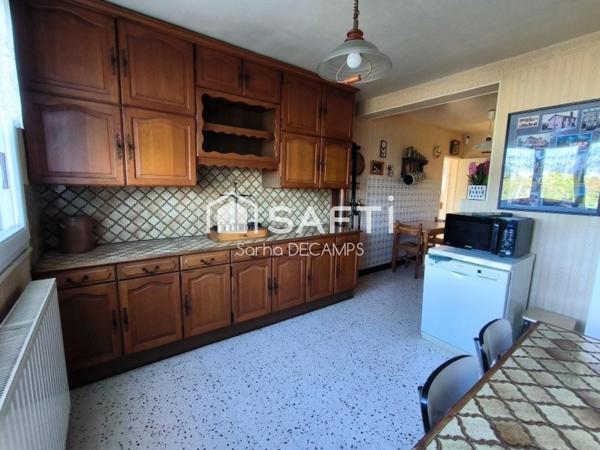 Maison de plein pied sur sous-sol, véranda, jardin de 621 m².