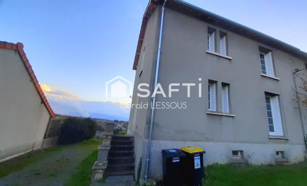 Maison de ville avec vue sur château