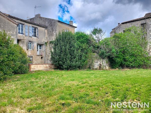A Vendre Maison en pierre de 139 m² avec jardin et dépendances au coeur de Mézin