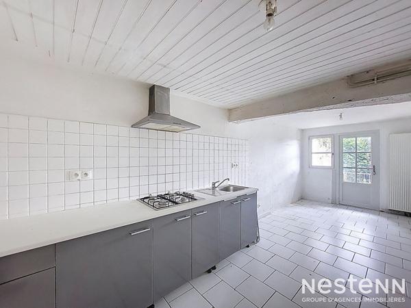 A Vendre Maison en pierre de 139 m² avec jardin et dépendances au coeur de Mézin