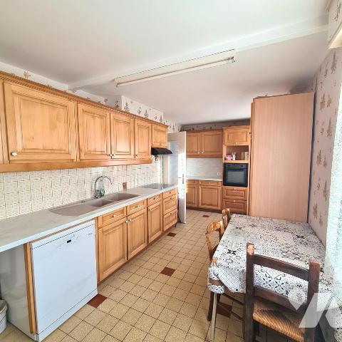 HOUPLINES limite PERENCHIES maison individuelle