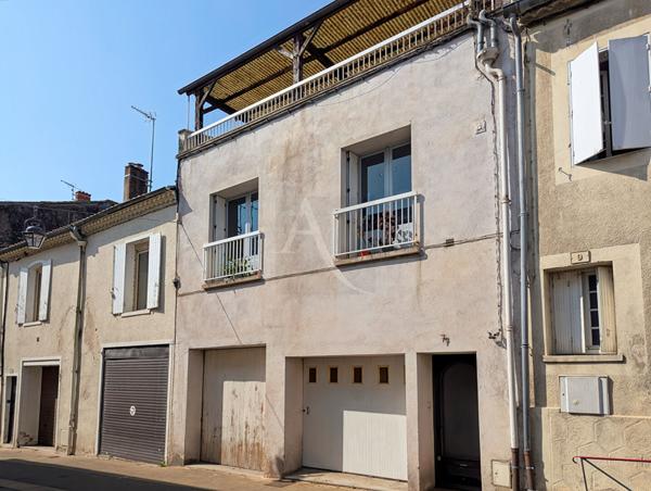 Charmante maison de ville avec garage et terrasse