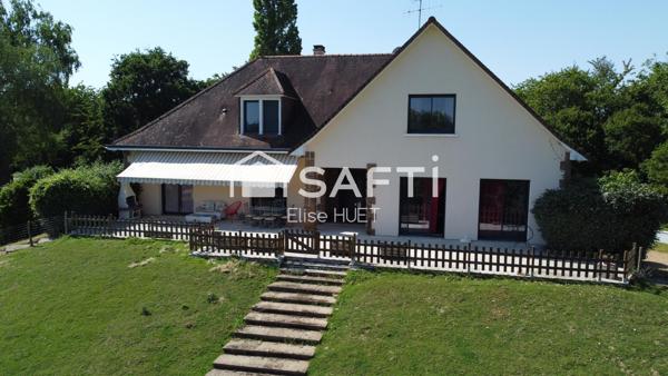 spacieuse propriété familiale nichée au cœur d’un terrain d’environ 7 000 m²