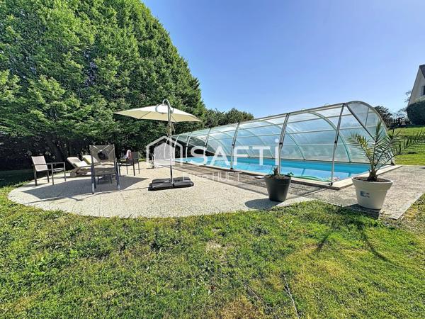 spacieuse propriété familiale nichée au cœur d’un terrain d’environ 7 000 m²