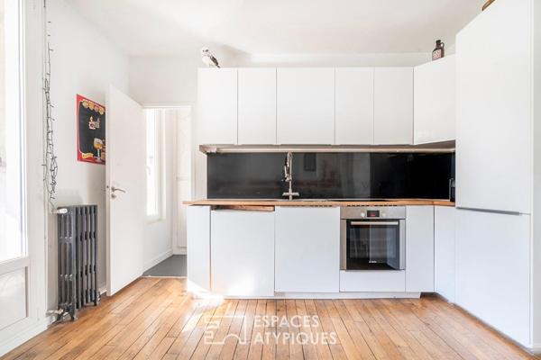 Maison divisée en duplex avec jardin