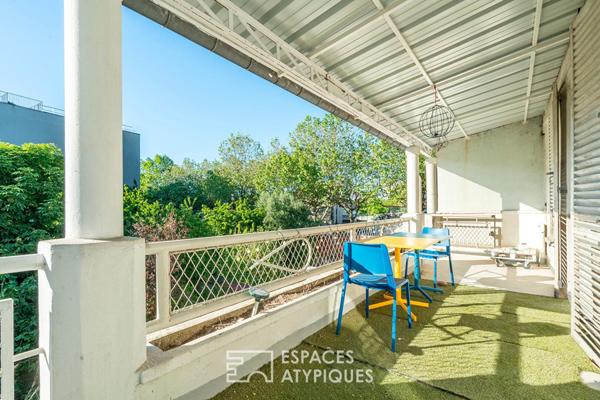 Maison divisée en duplex avec jardin