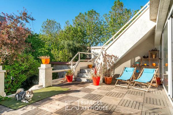 Maison divisée en duplex avec jardin