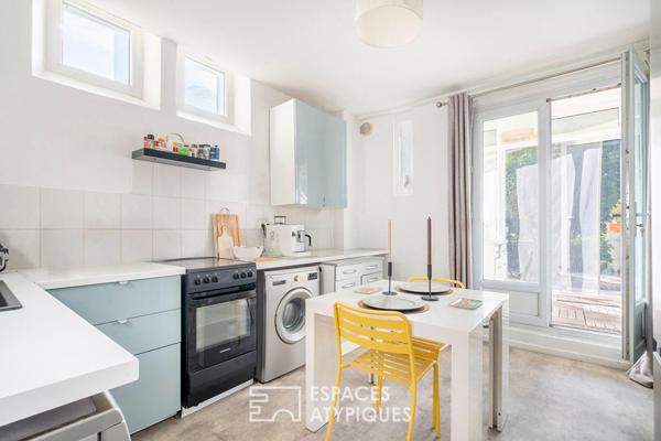 Maison divisée en duplex avec jardin