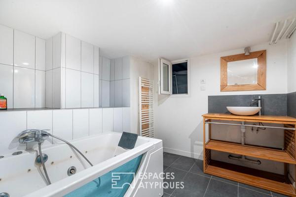 Maison divisée en duplex avec jardin