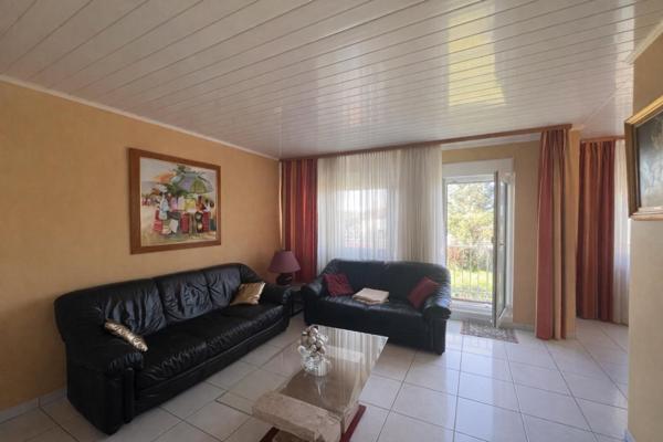 Appartement Rdc 4 chambres, terrain privatif 229 m2