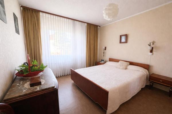 Appartement Rdc 4 chambres, terrain privatif 229 m2