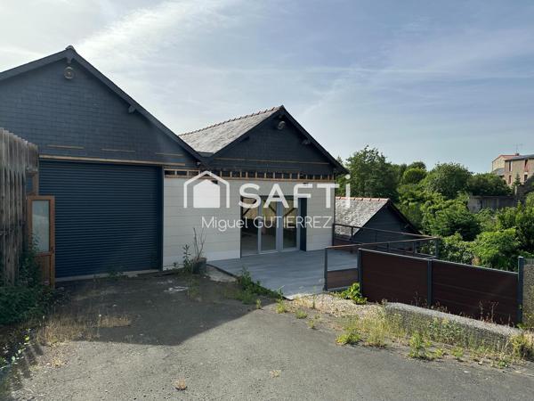 Opportunité d'investissement – Local commercial/artisanal de 350 m² sur grand terrain, fort potentiel de réhabilitation