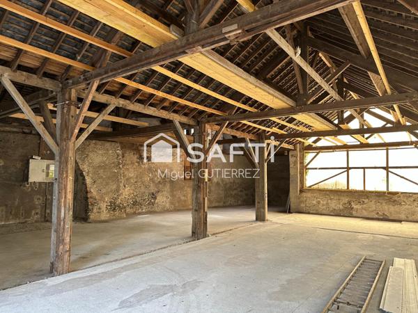 Opportunité d'investissement – Local commercial/artisanal de 350 m² sur grand terrain, fort potentiel de réhabilitation