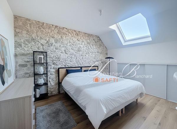 Maison de caractère à Billiat – 269 m² alliant charme de la pierre et modernité