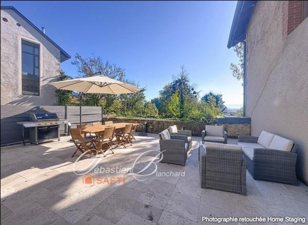 Maison de caractère à Billiat – 269 m² alliant charme de la pierre et modernité