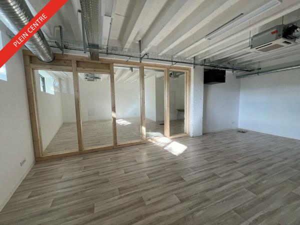 Bureau open space à louer à Bourg-les-Valence avec parking privatif