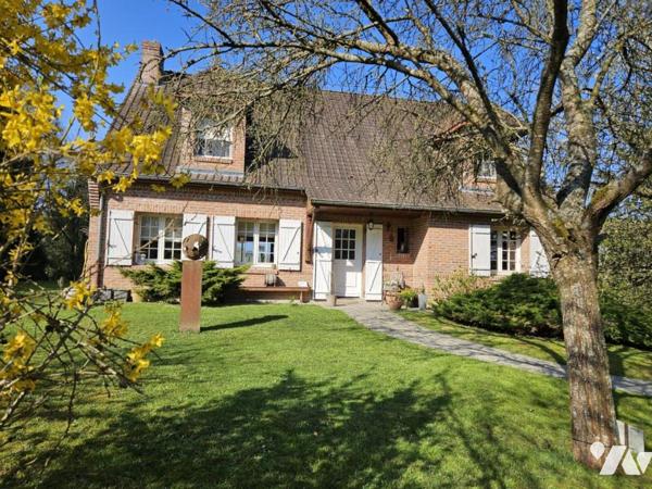 Pavillon individuel sur 8412 m² de terrain arboré