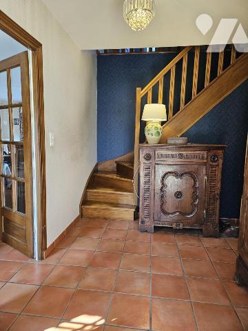 Pavillon individuel sur 8412 m² de terrain arboré