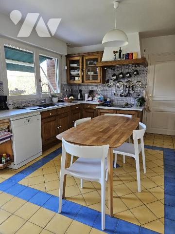 Pavillon individuel sur 8412 m² de terrain arboré