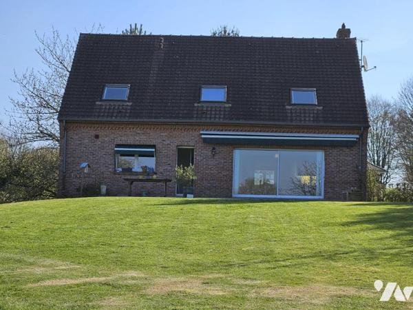 Pavillon individuel sur 8412 m² de terrain arboré