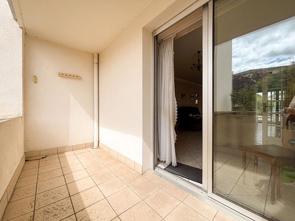 A vendre - Appartement T4 de 96 m² avec balcons, stationnement et cave dans résidence avec ascenseur "Angers Gare/ Lafayette"