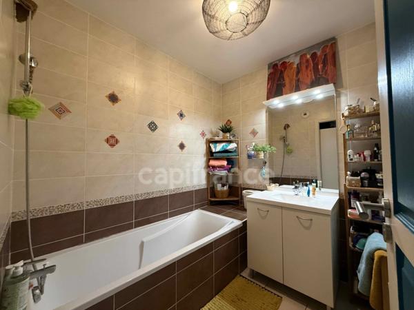 Appartement à vendre 3 pièces THOIRY (01) - 75m2 avec jardin privatif, terrasse et garage