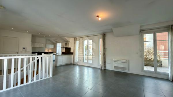 Duplex d'exception en dernier étage avec terrasse plein sud en centre-ville