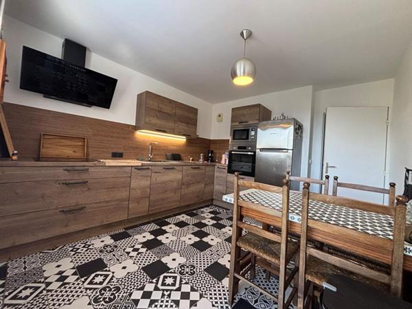 Appartement T4 88m2 à Saint-Romain-De-Colbosc plein centre avec parking en sous sol