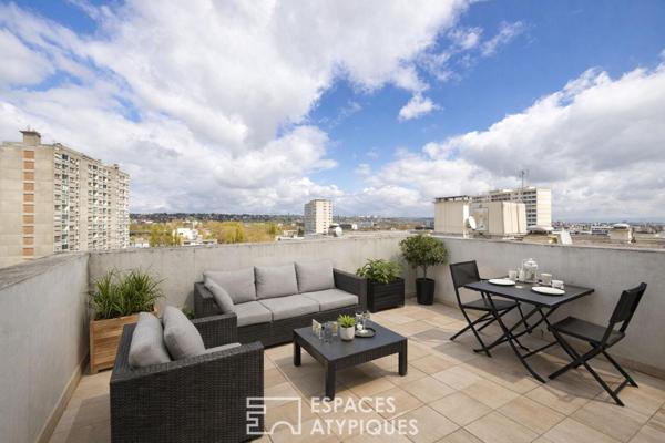 Appartement rénové avec terrasse en avant dernier étage